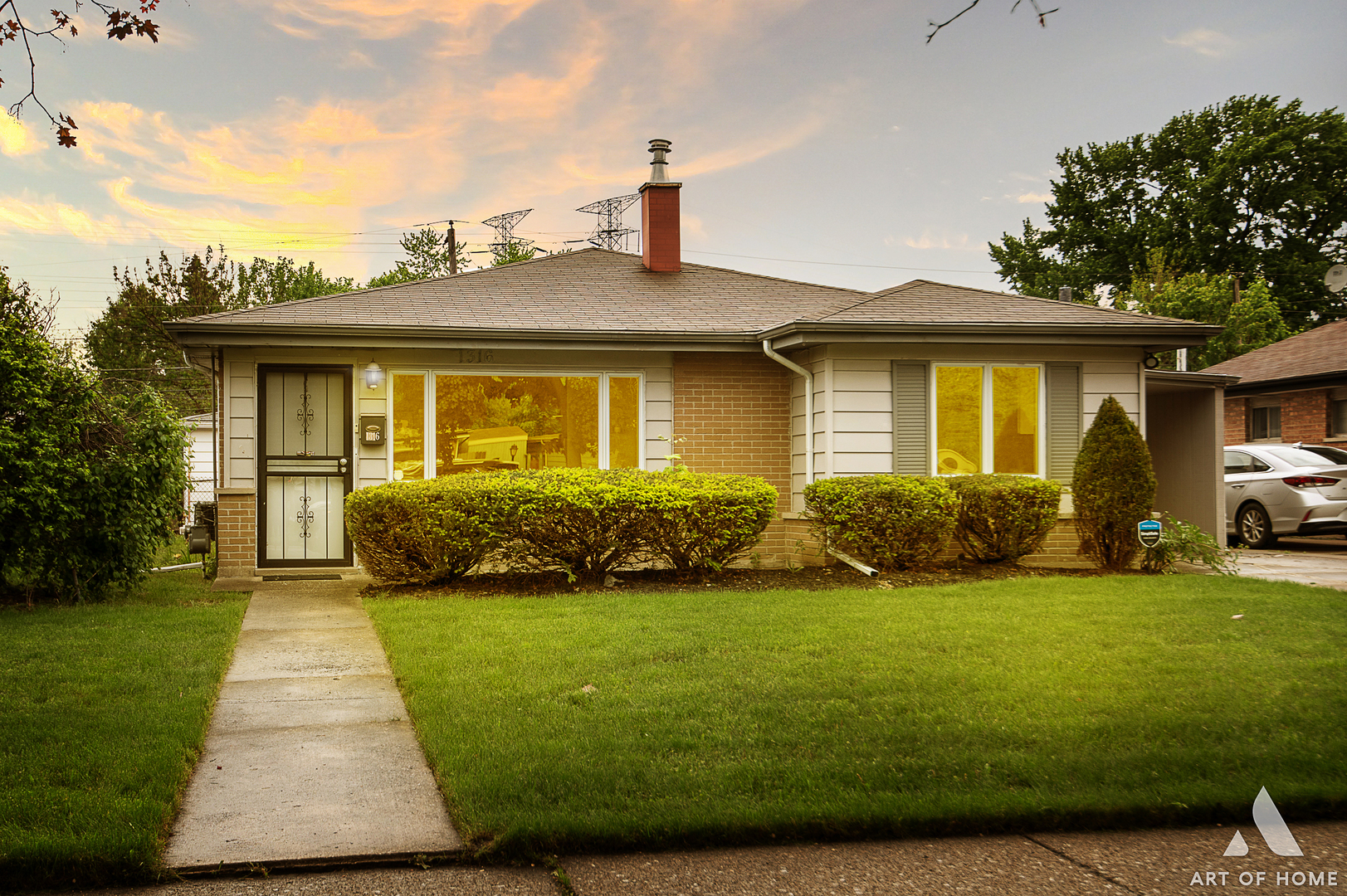 a front view of a house with garden