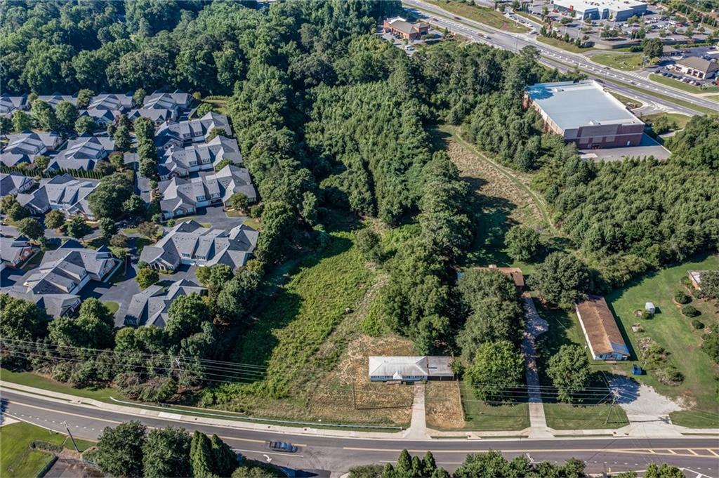 an aerial view of residential house with outdoor space