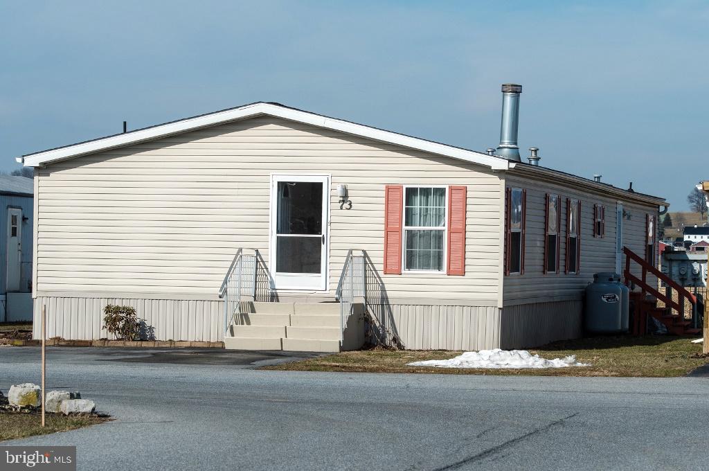 a view of a house with a patio