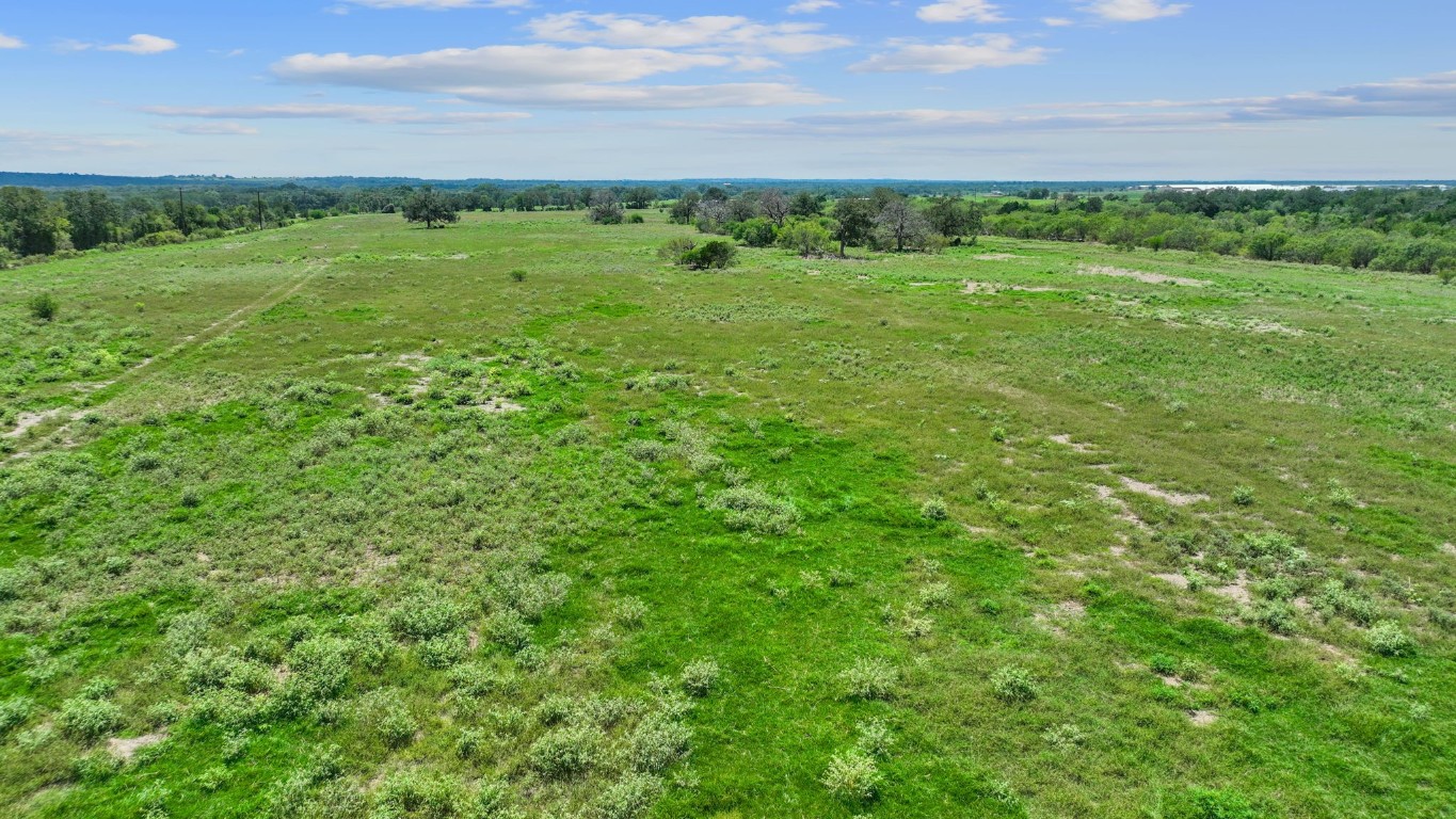 a view of a green field with lots of green space