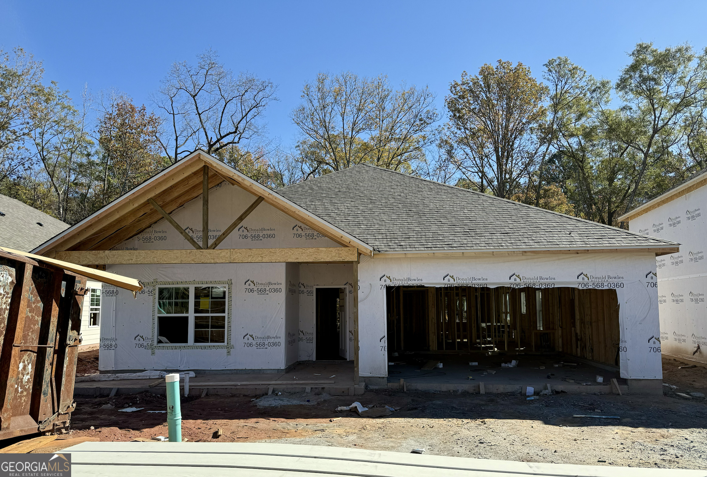 a front view of a house with yard