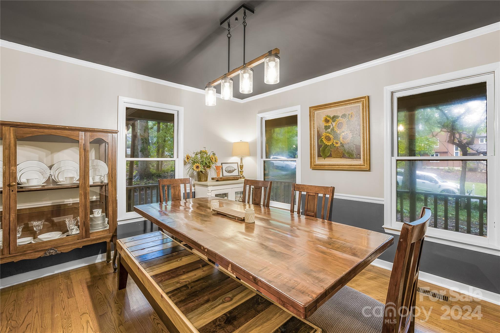 a dining room with wooden floor