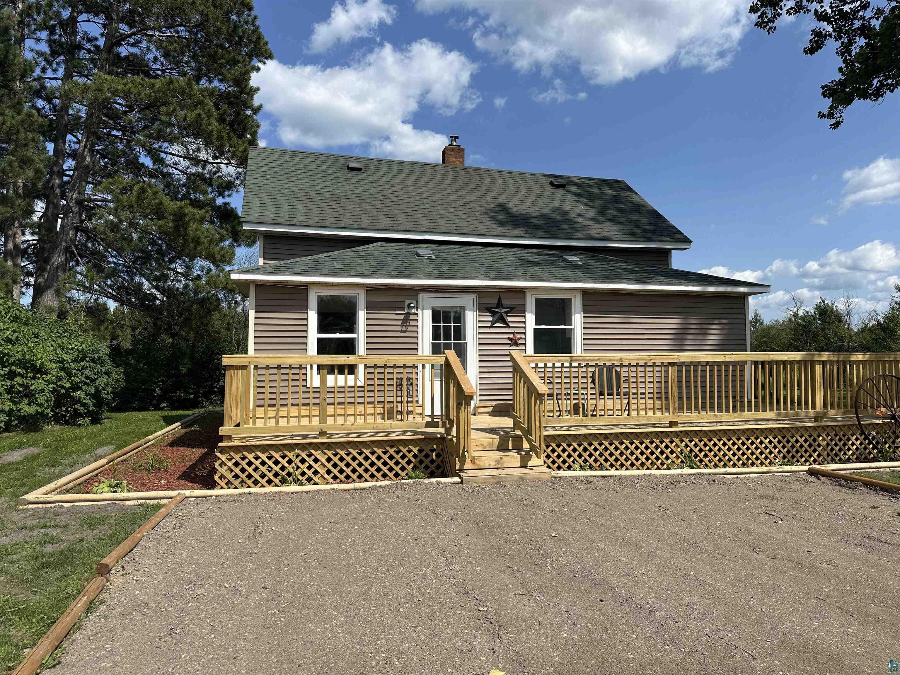 View of front facade with a deck