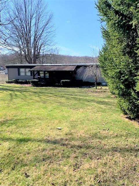 a house view with a swimming pool