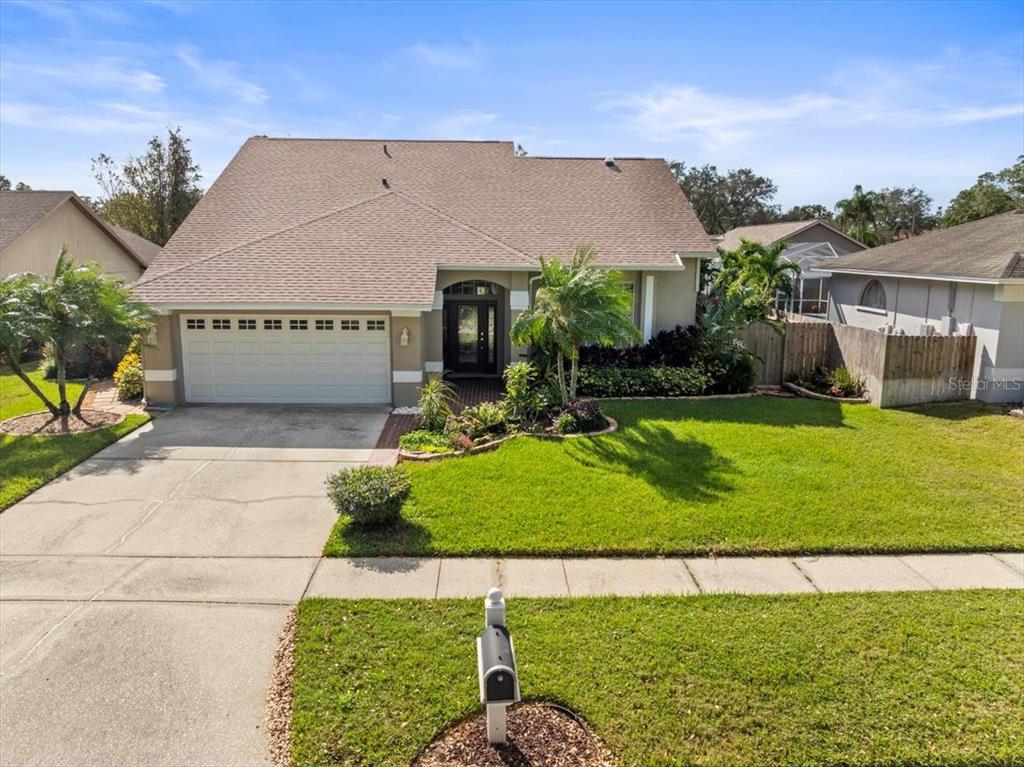 a house view with a garden space