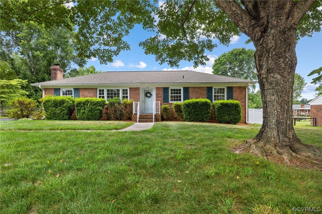 front view of a house with a yard