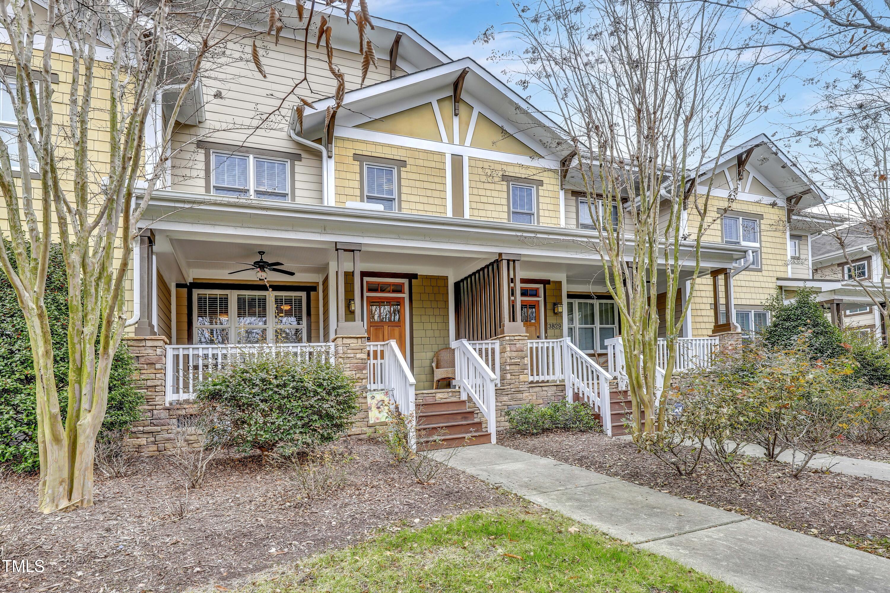 front view of a house with a yard