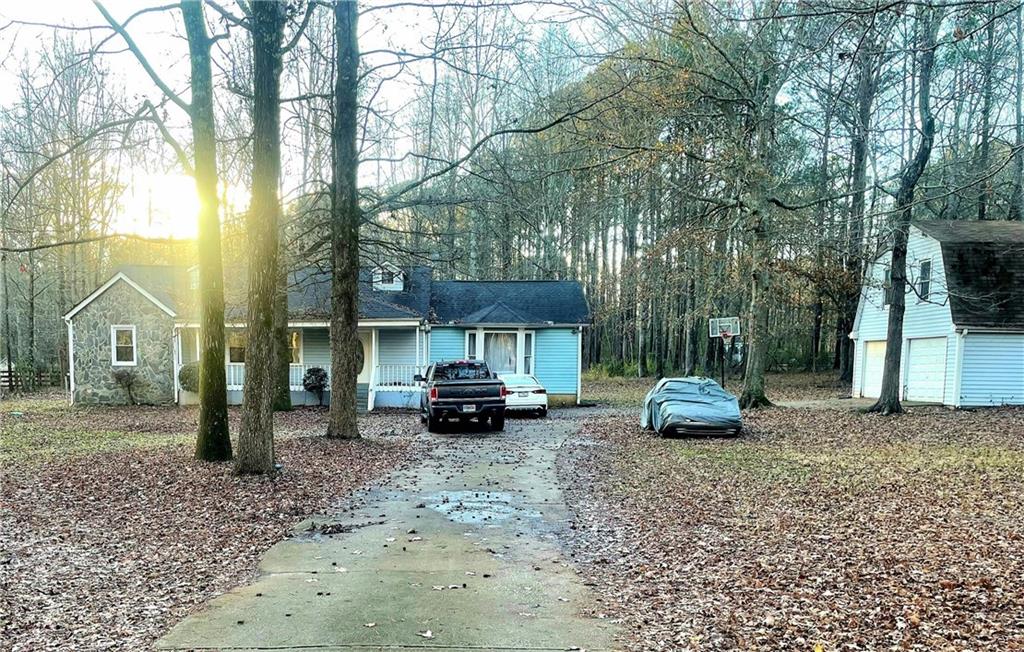 a view of car parked in front of house