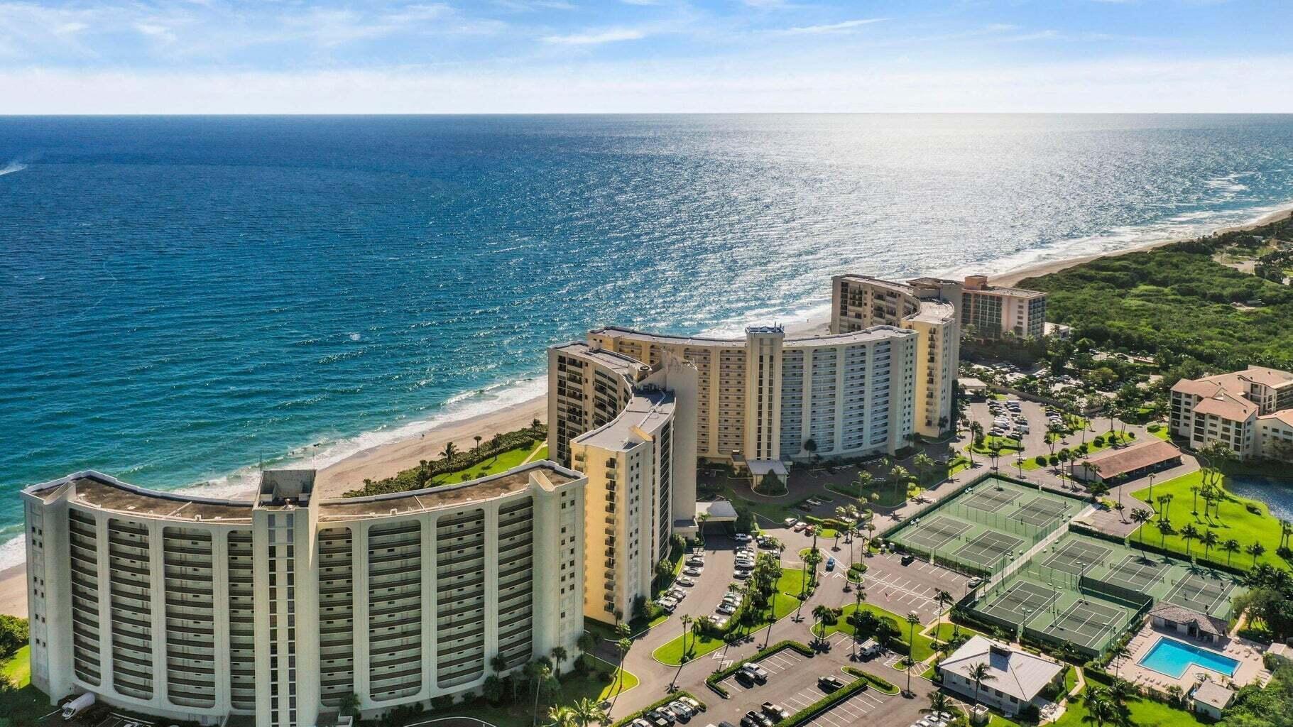 a view of a balcony with an ocean