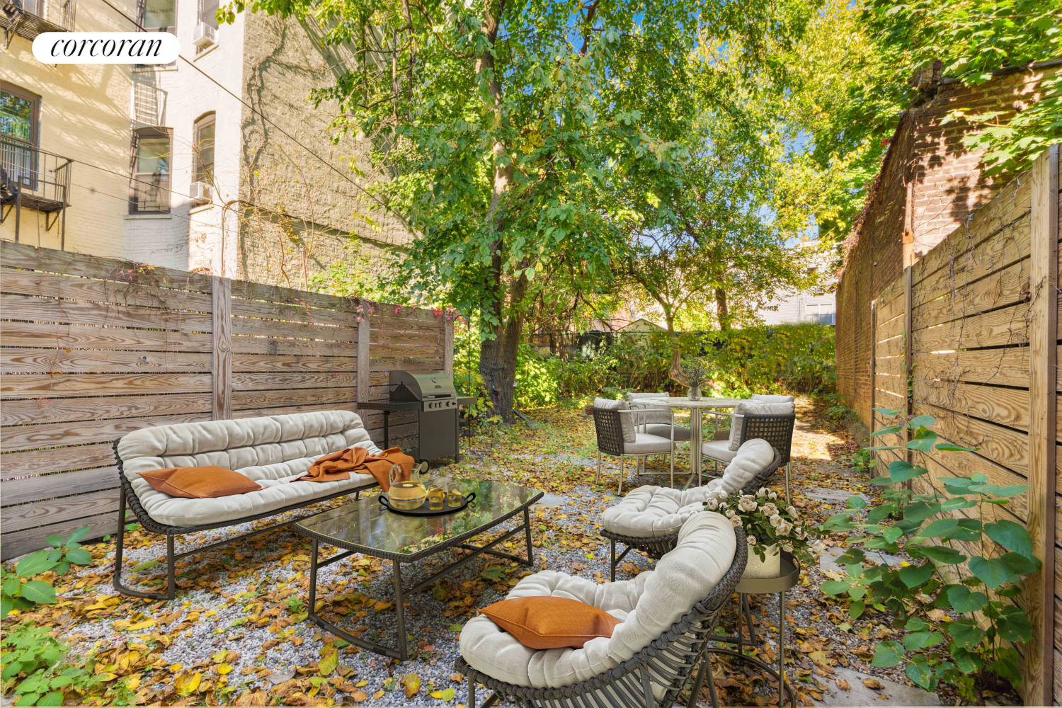 a backyard of a house with outdoor seating