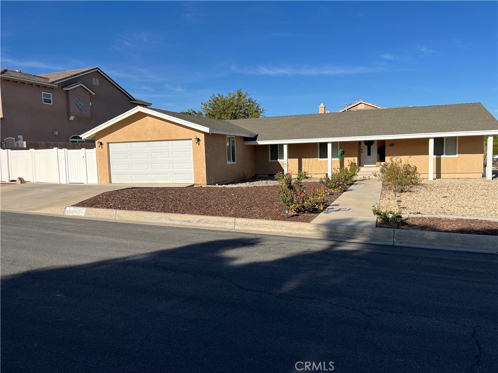 a front view of a house with yard