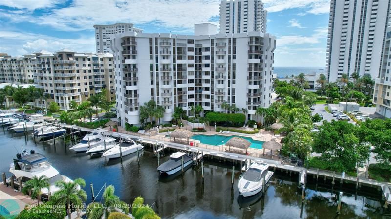 a view of a lake with tall buildings