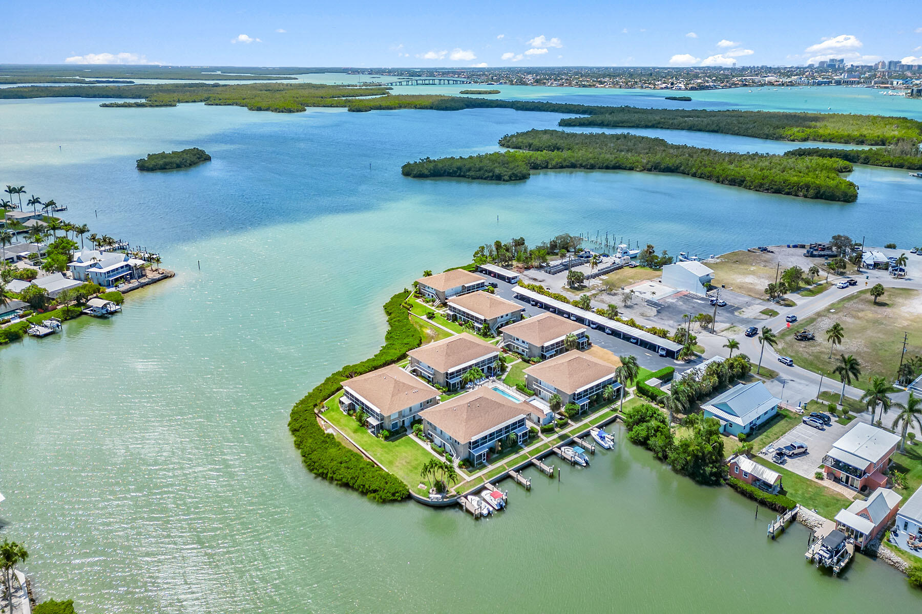 an aerial view of a house with a lake view