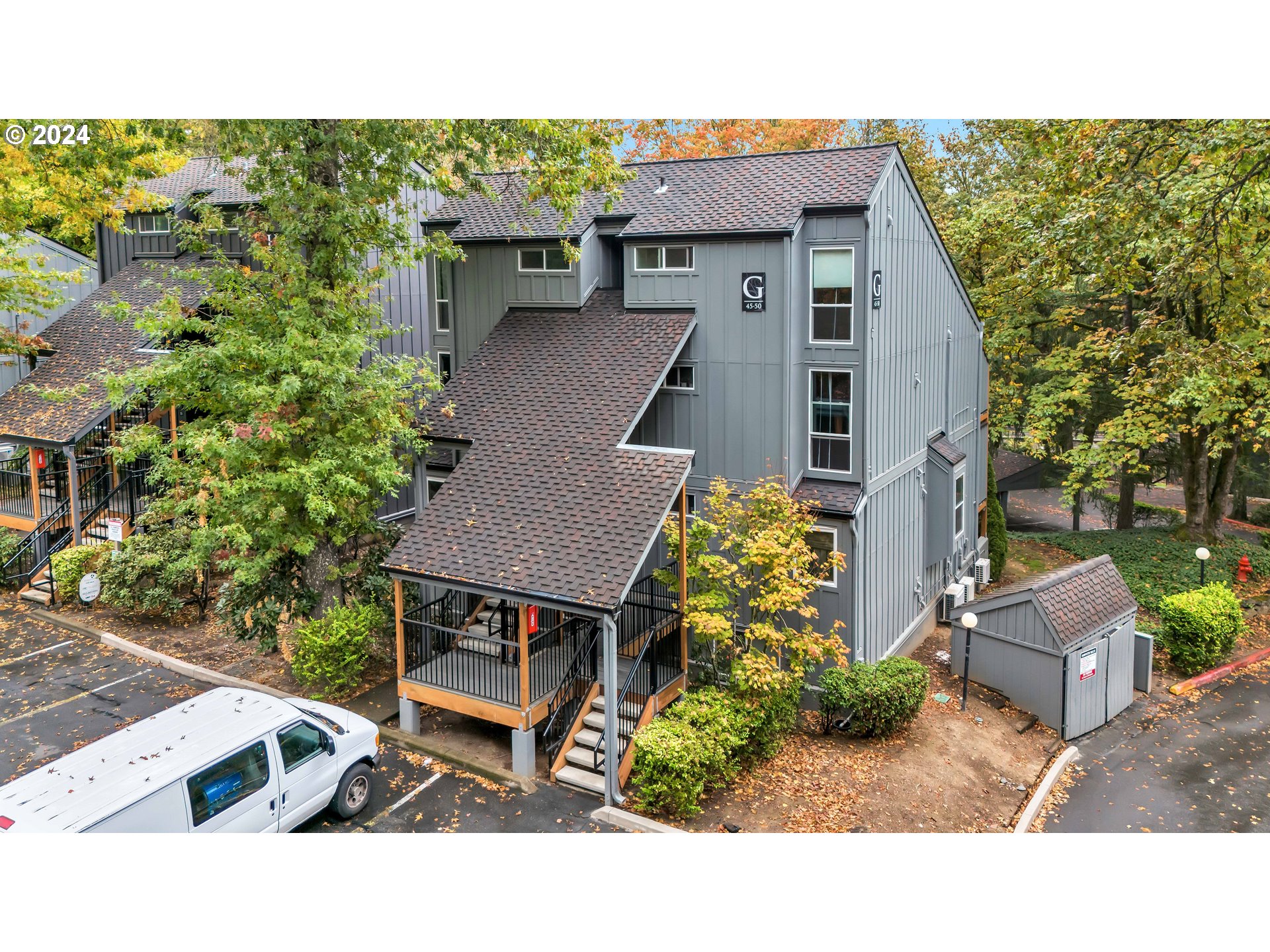 a aerial view of a house with a garden