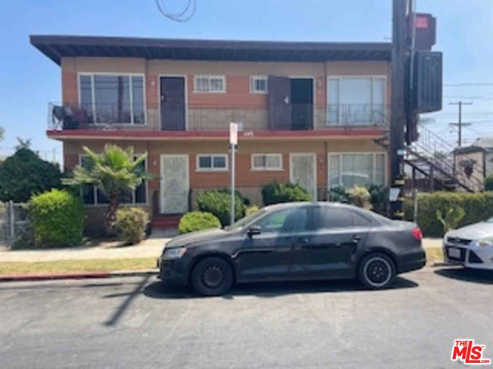 a car parked in front of a house