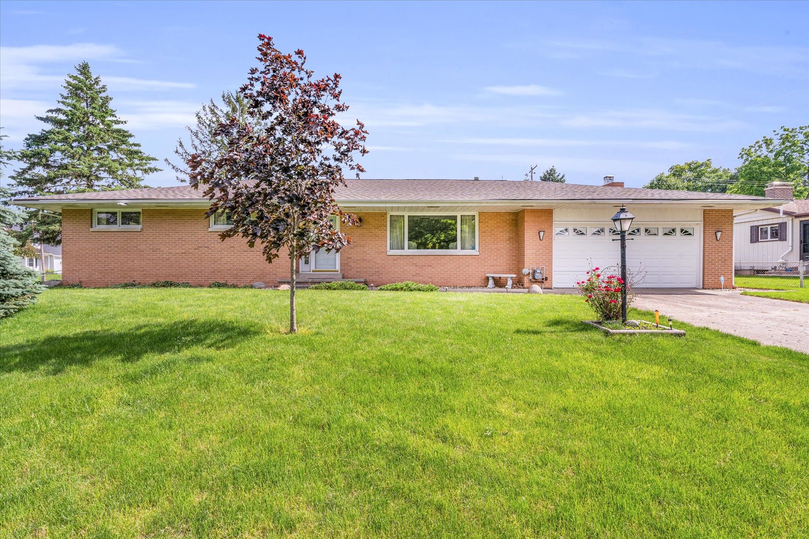 a house view with a garden space