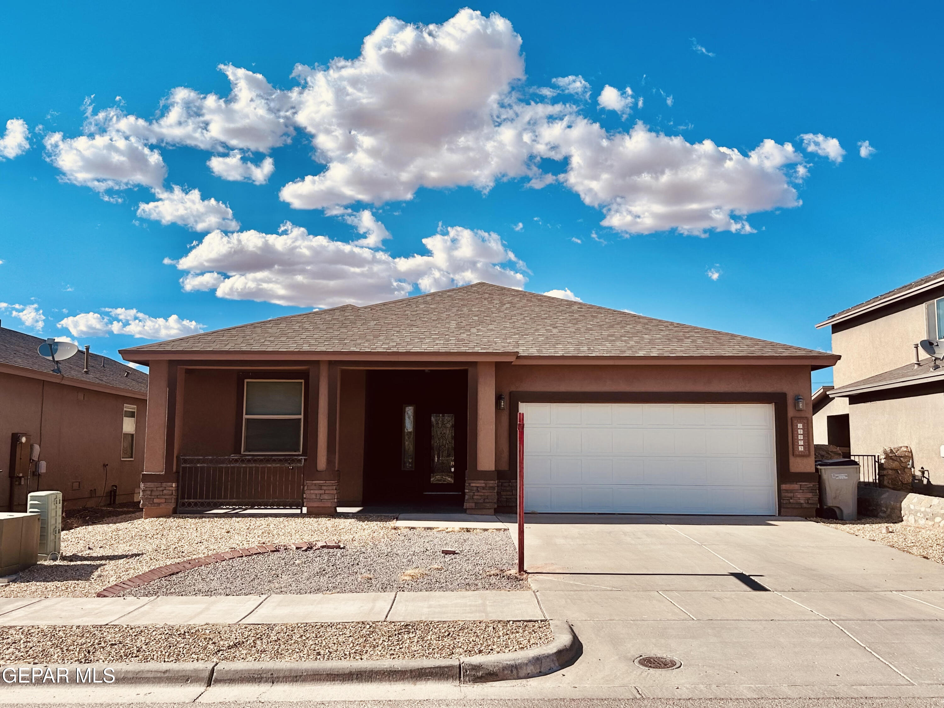 a view of a house with a garage