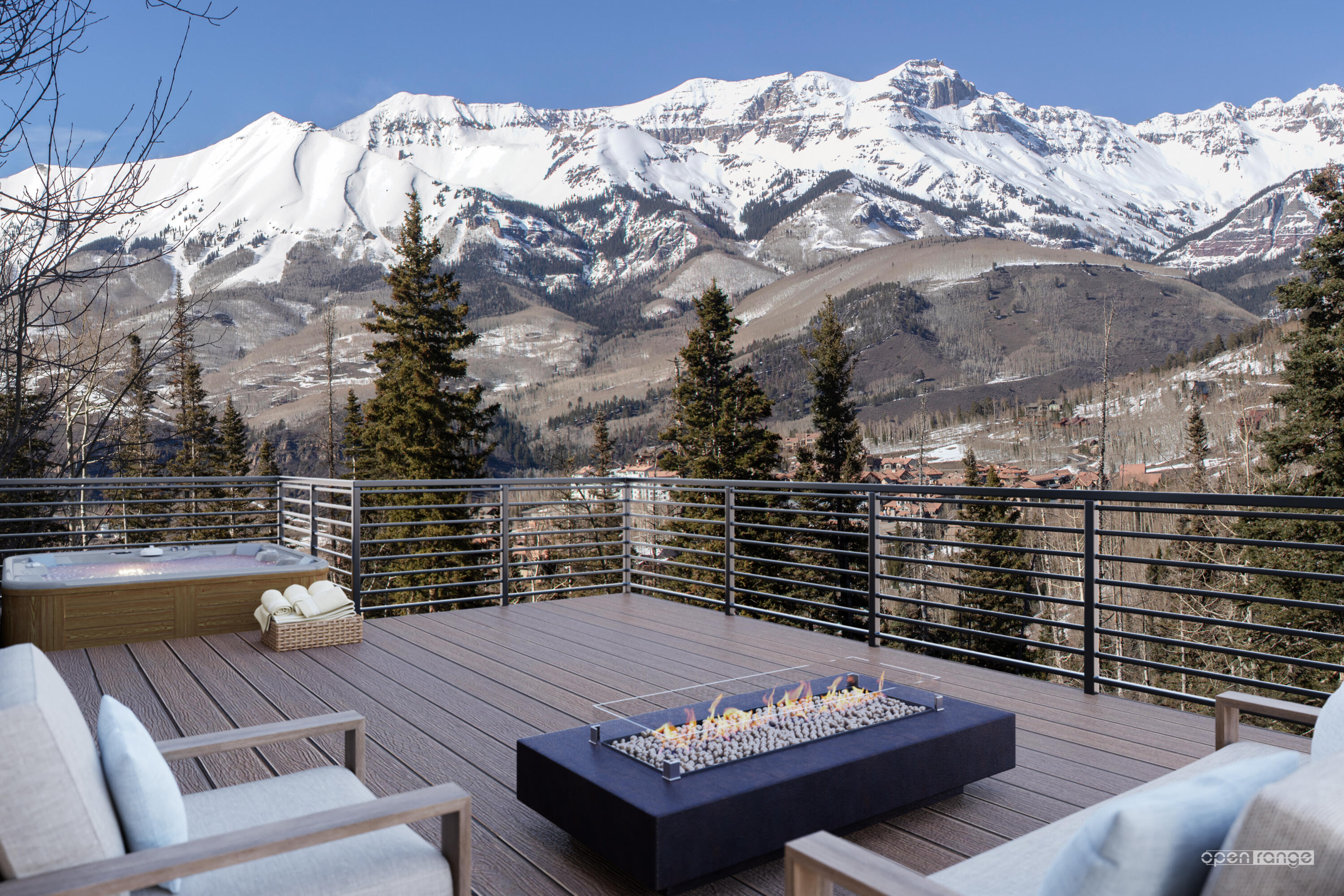 a terrace with outdoor seating and trees