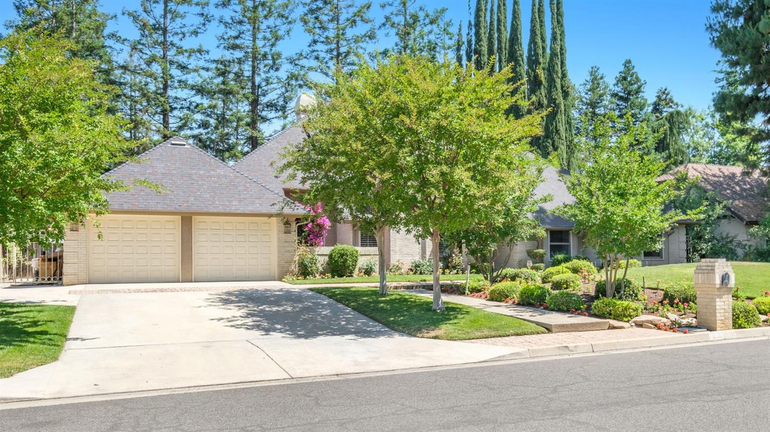 front view of a house next to a yard