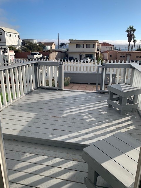 a view of a balcony with city view