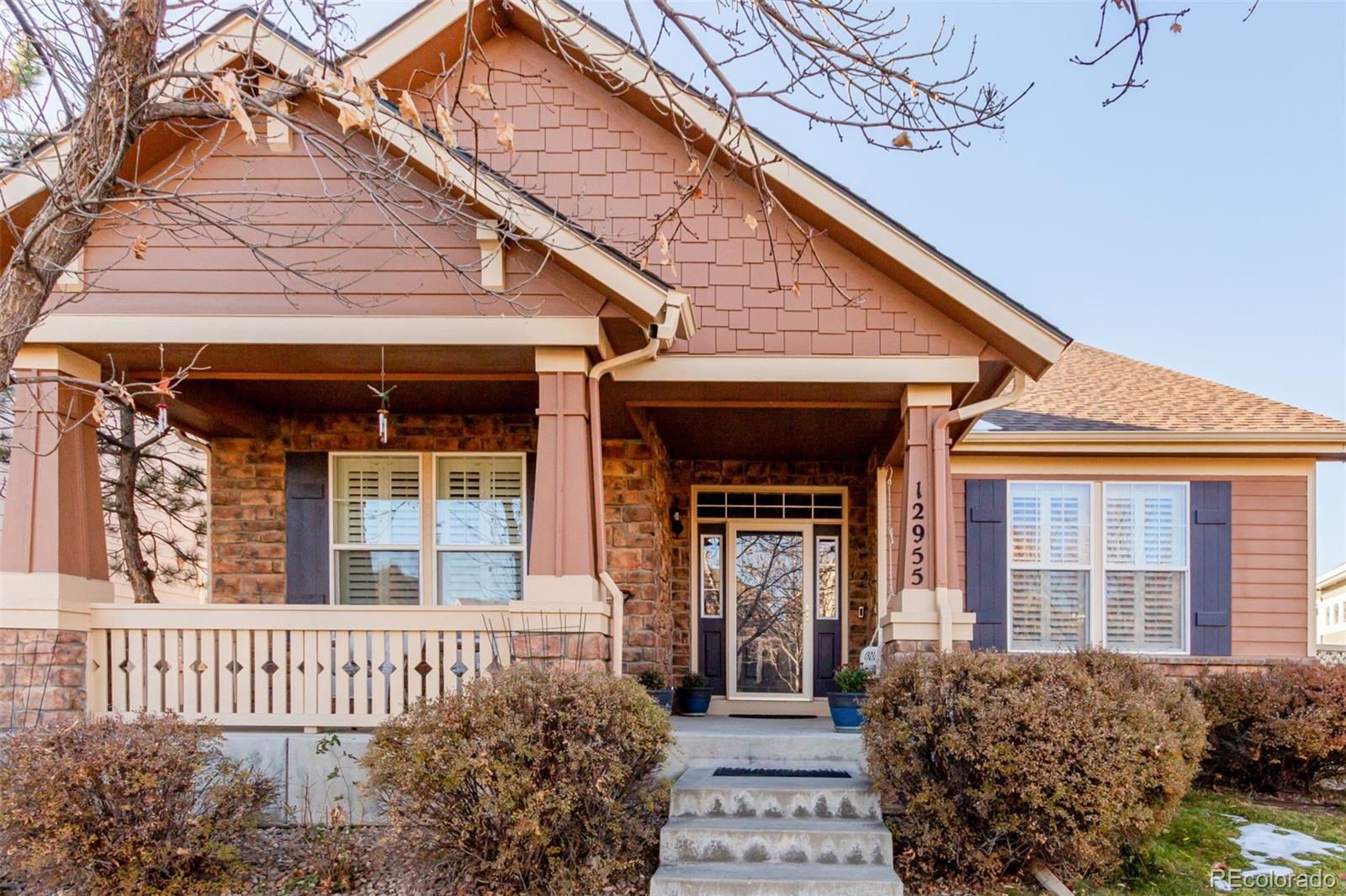 a front view of a house with a porch