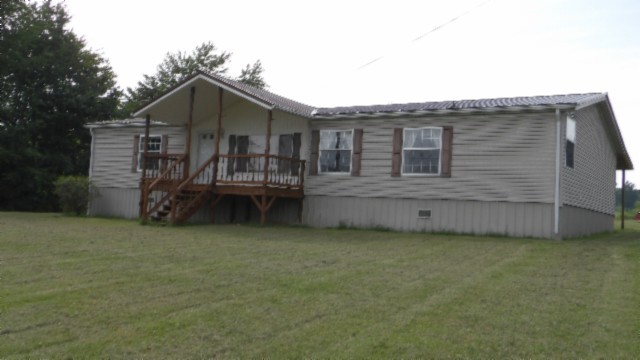 a front view of house with yard