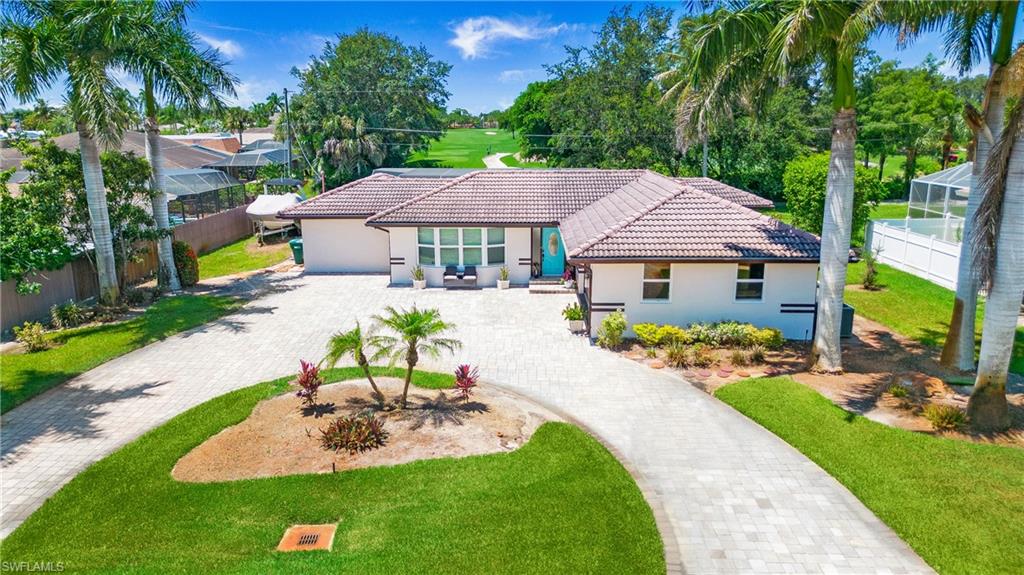 Welcome to 560 Cypress Way East.  This updated home is in sought after Palm River Estates