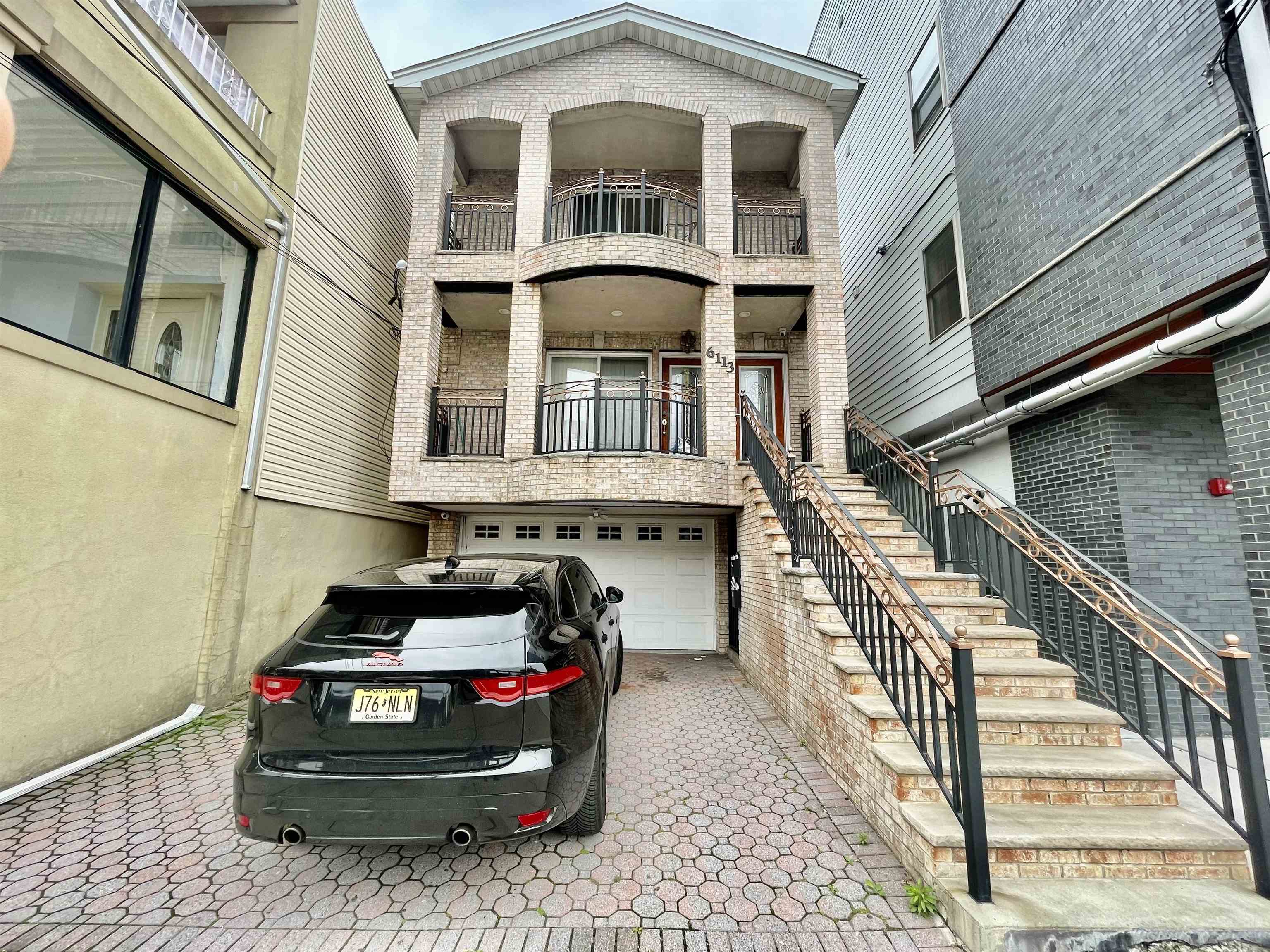 a front view of a house with balcony