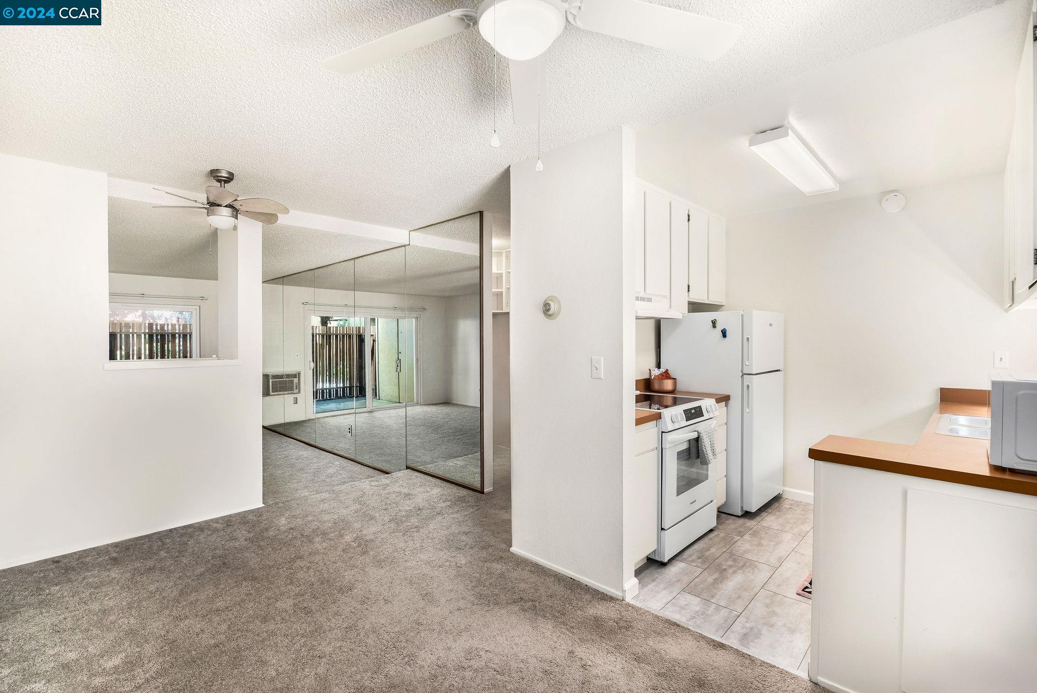 a view of a kitchen with a sink