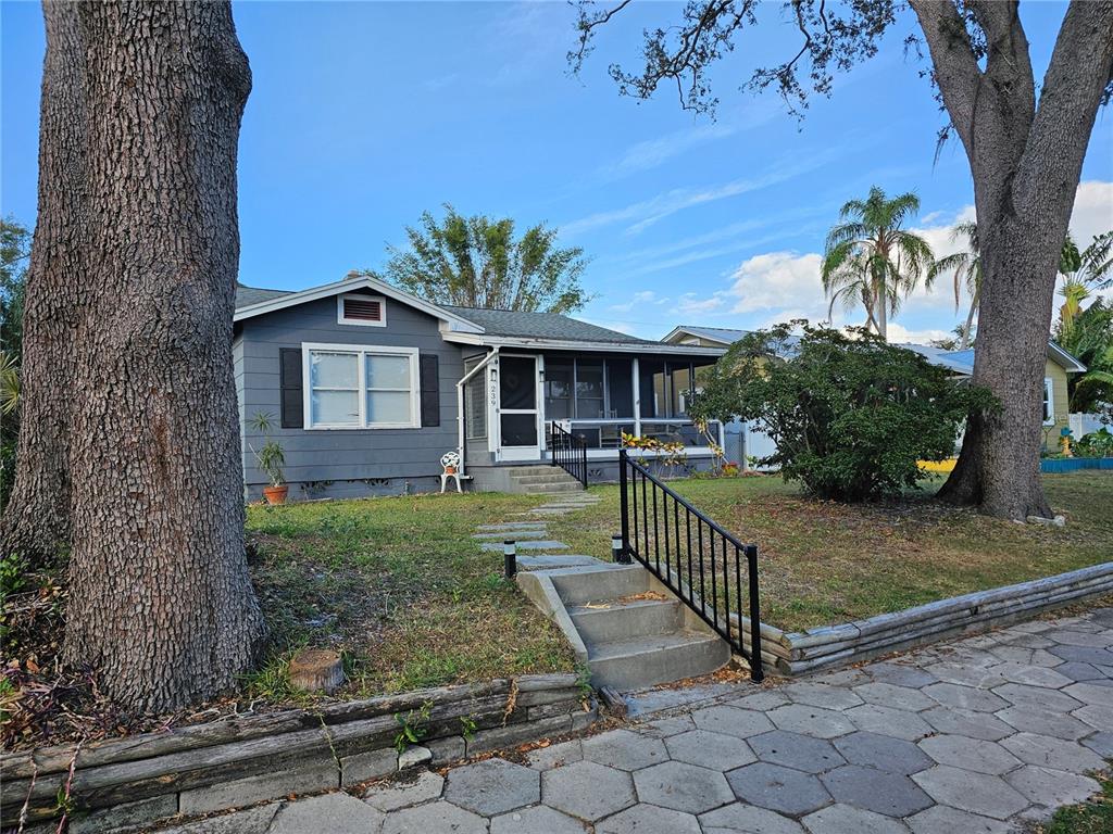 a view of a house with a yard