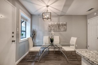 a view of a dining room with furniture