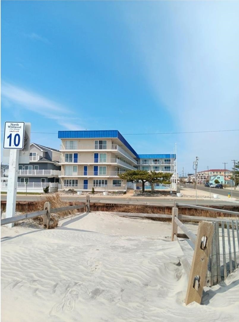 a view of a swimming pool and a balcony