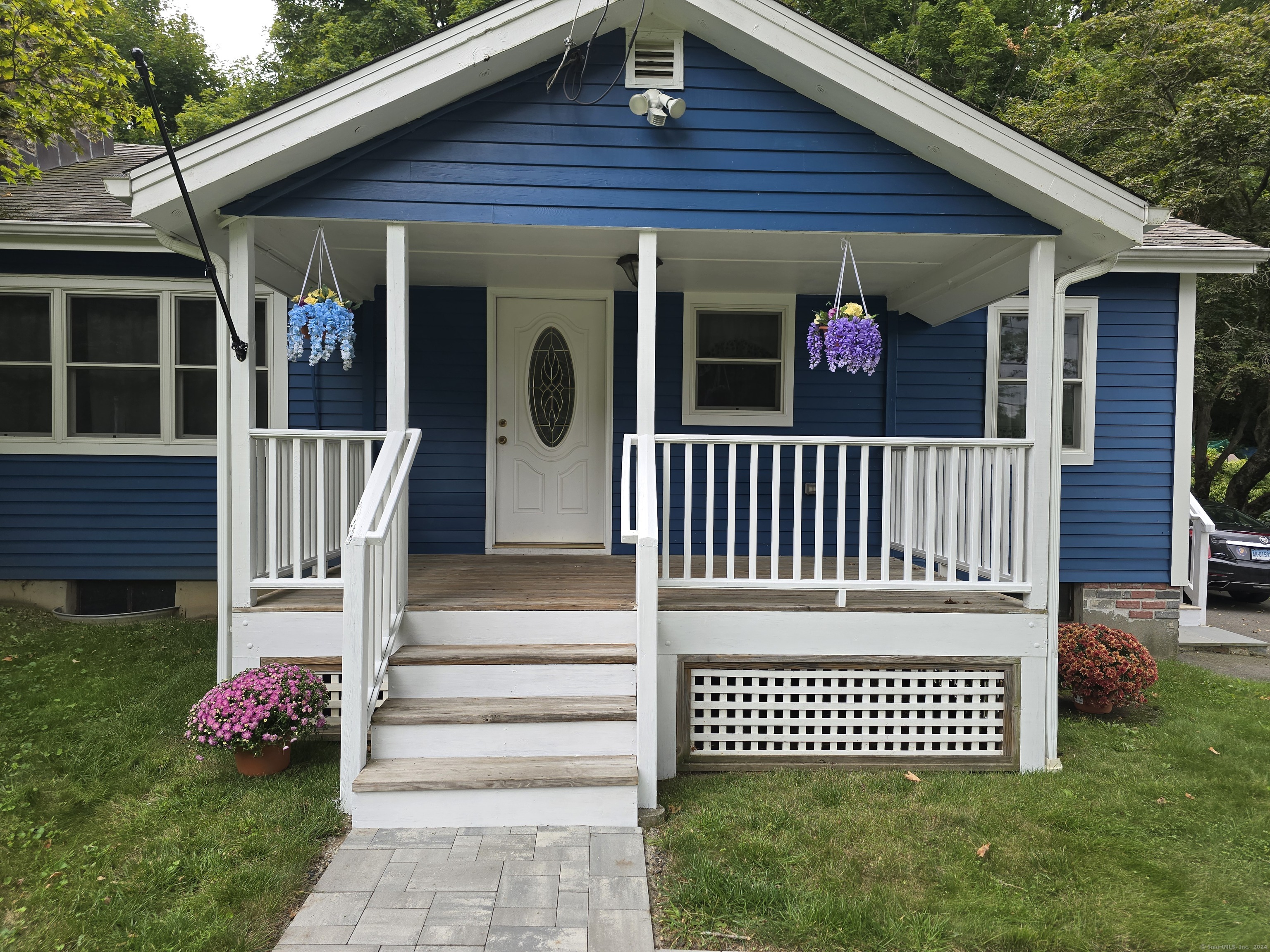 a view of a house that has a deck