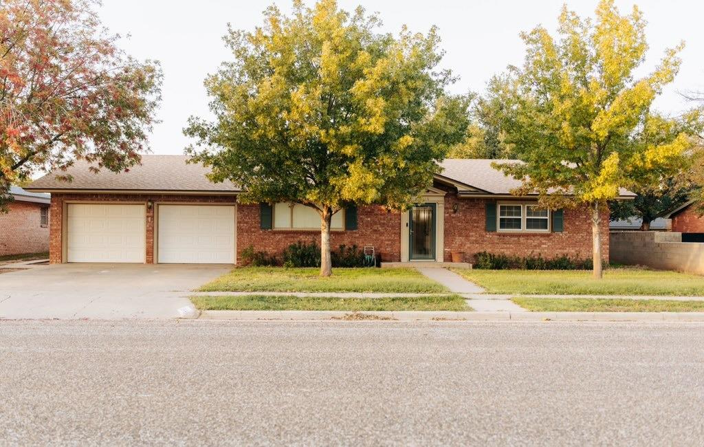 a house with trees in front of it