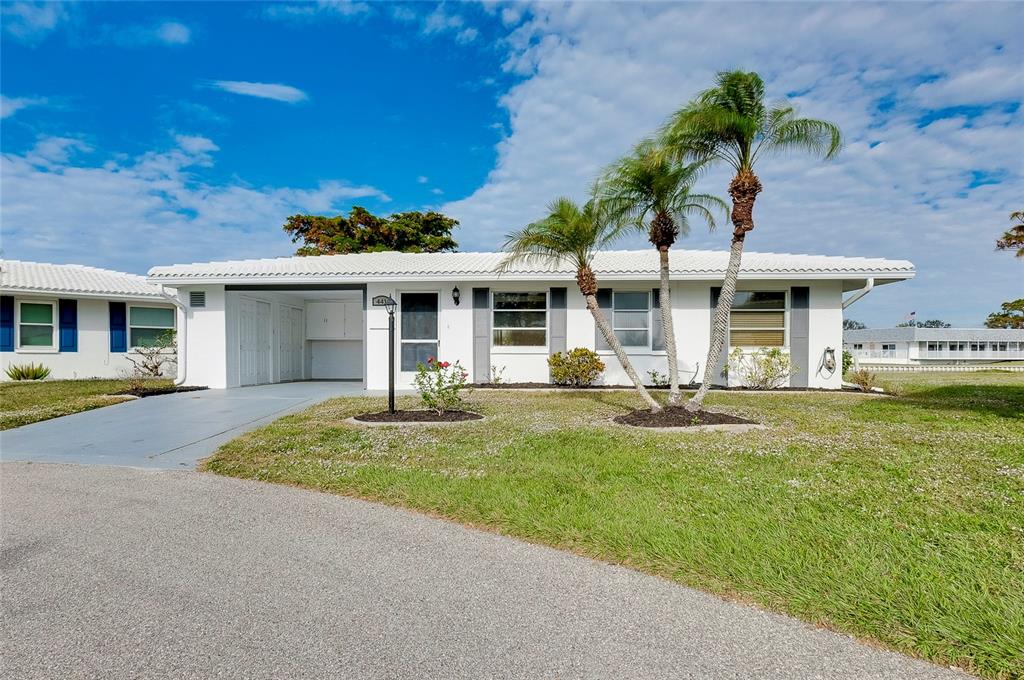 front view of a house with a yard