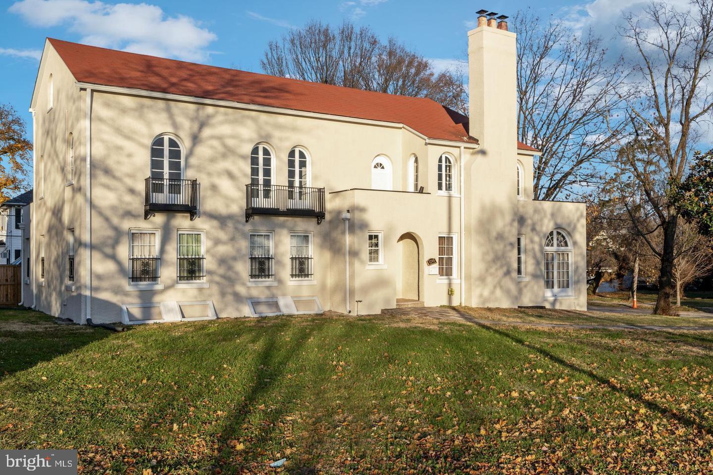 a front view of a building with garden