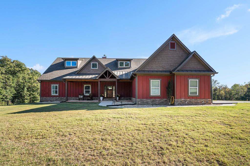 a view of a house with a big yard