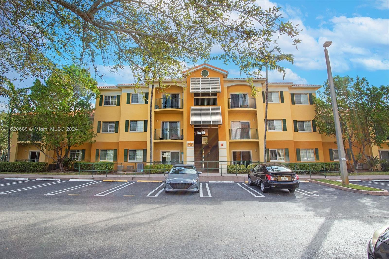 a front view of a building with street view