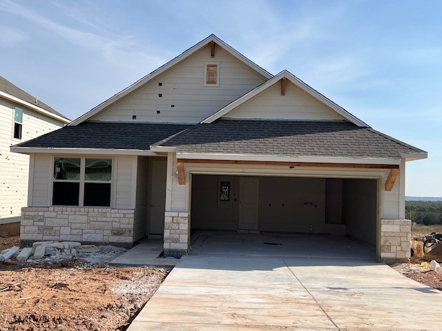 a front view of a house with a garage