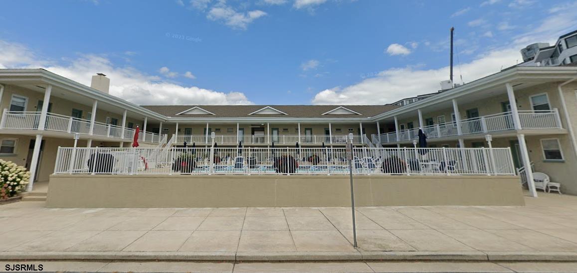 a view of a building with a swimming pool