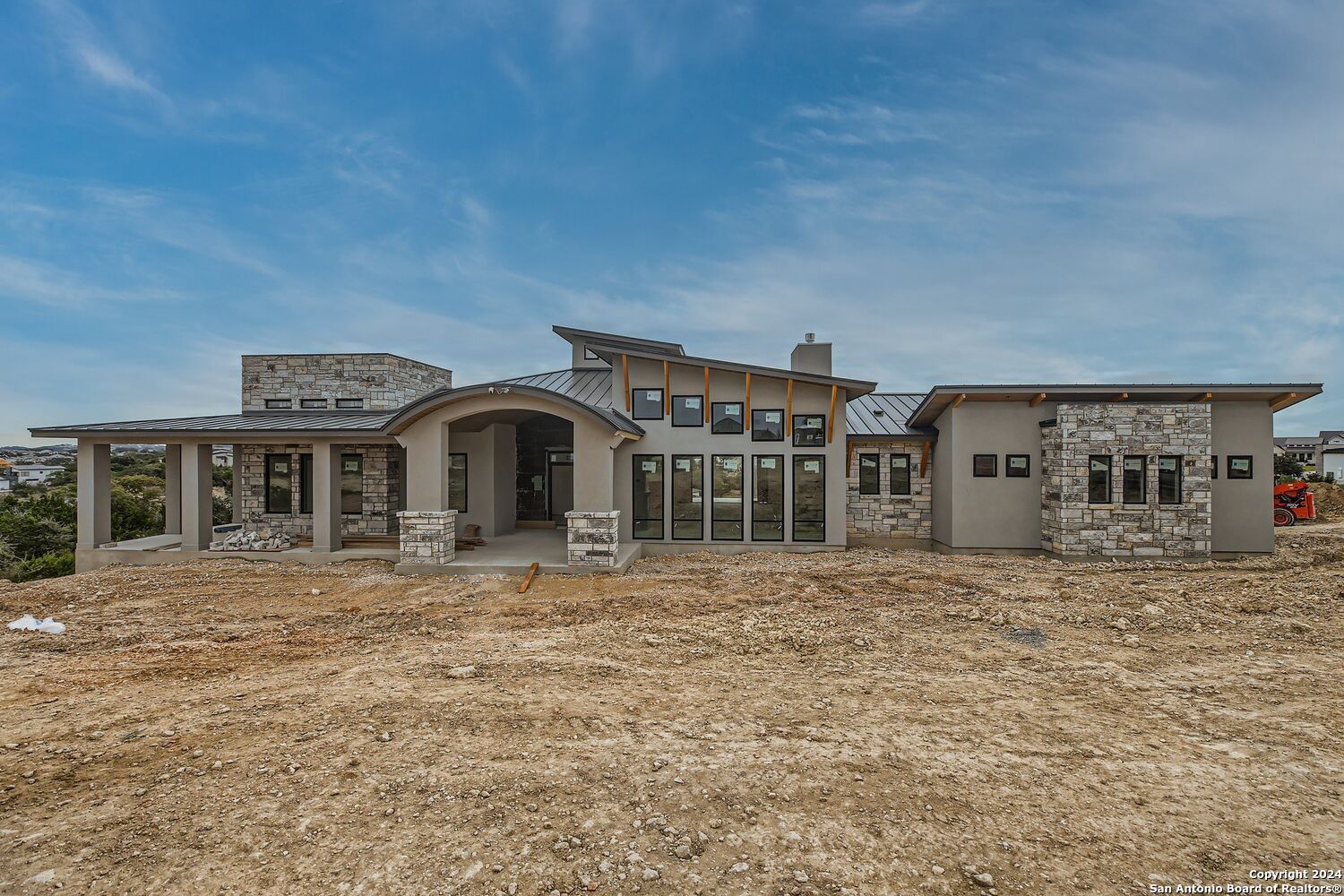 a front view of a house with yard