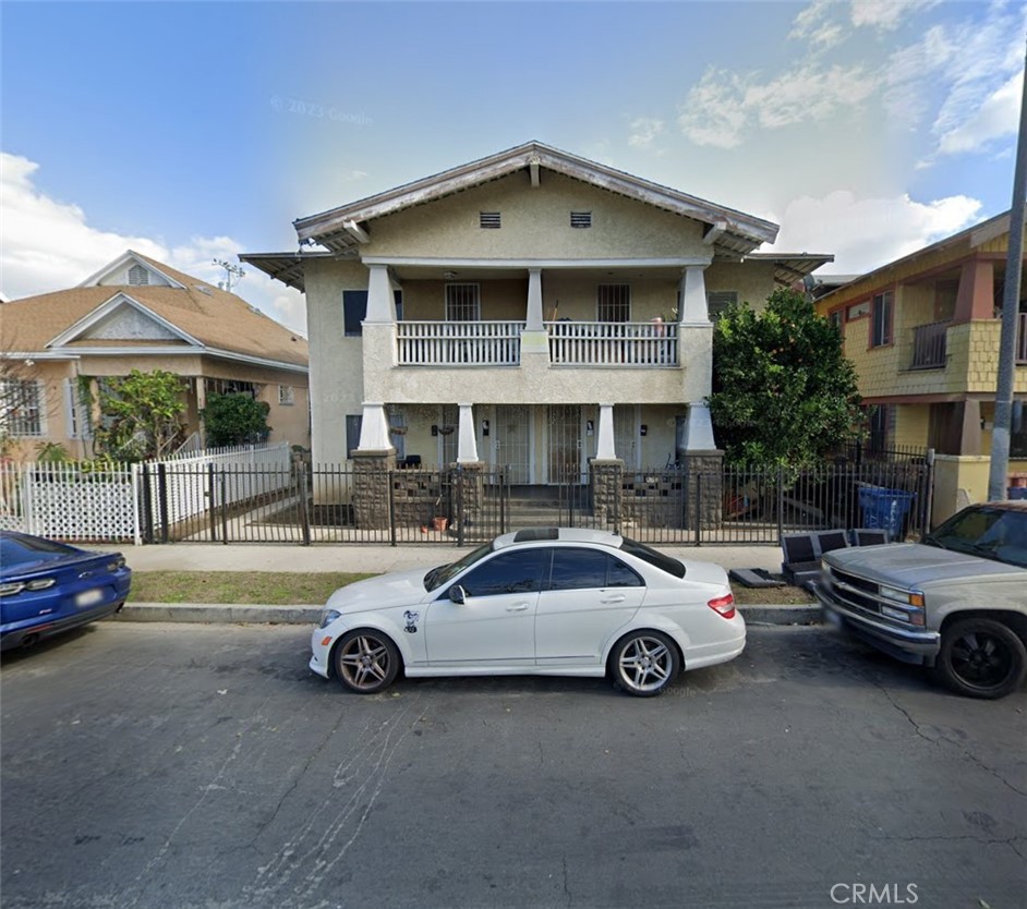 a car parked in front of a house