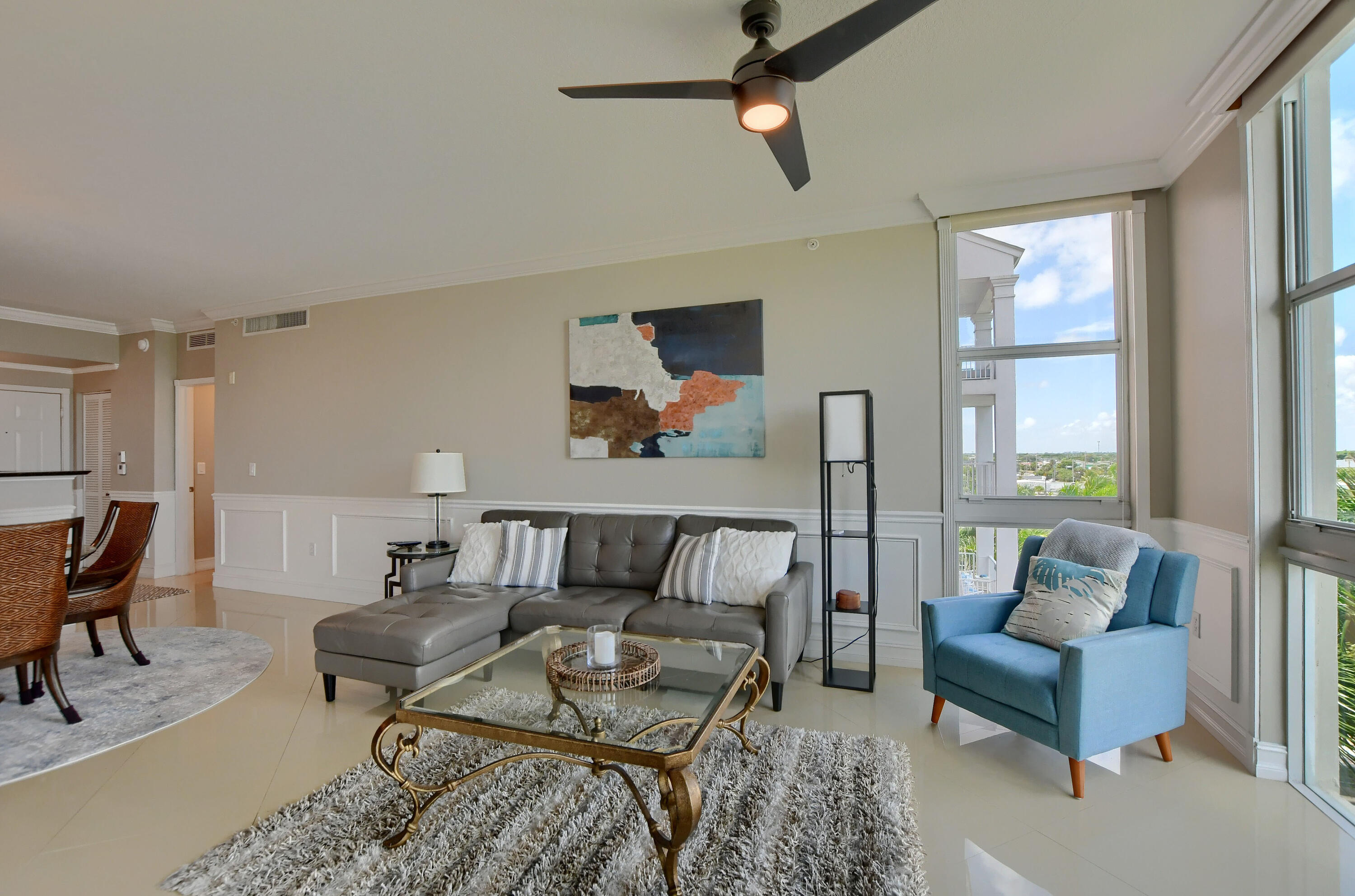 a living room with furniture and a window