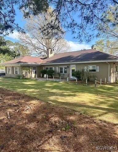 a view of a house with a big yard