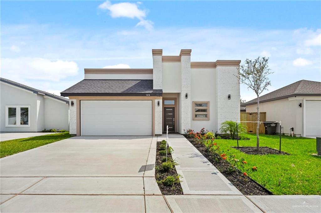 View of front of property featuring a front lawn