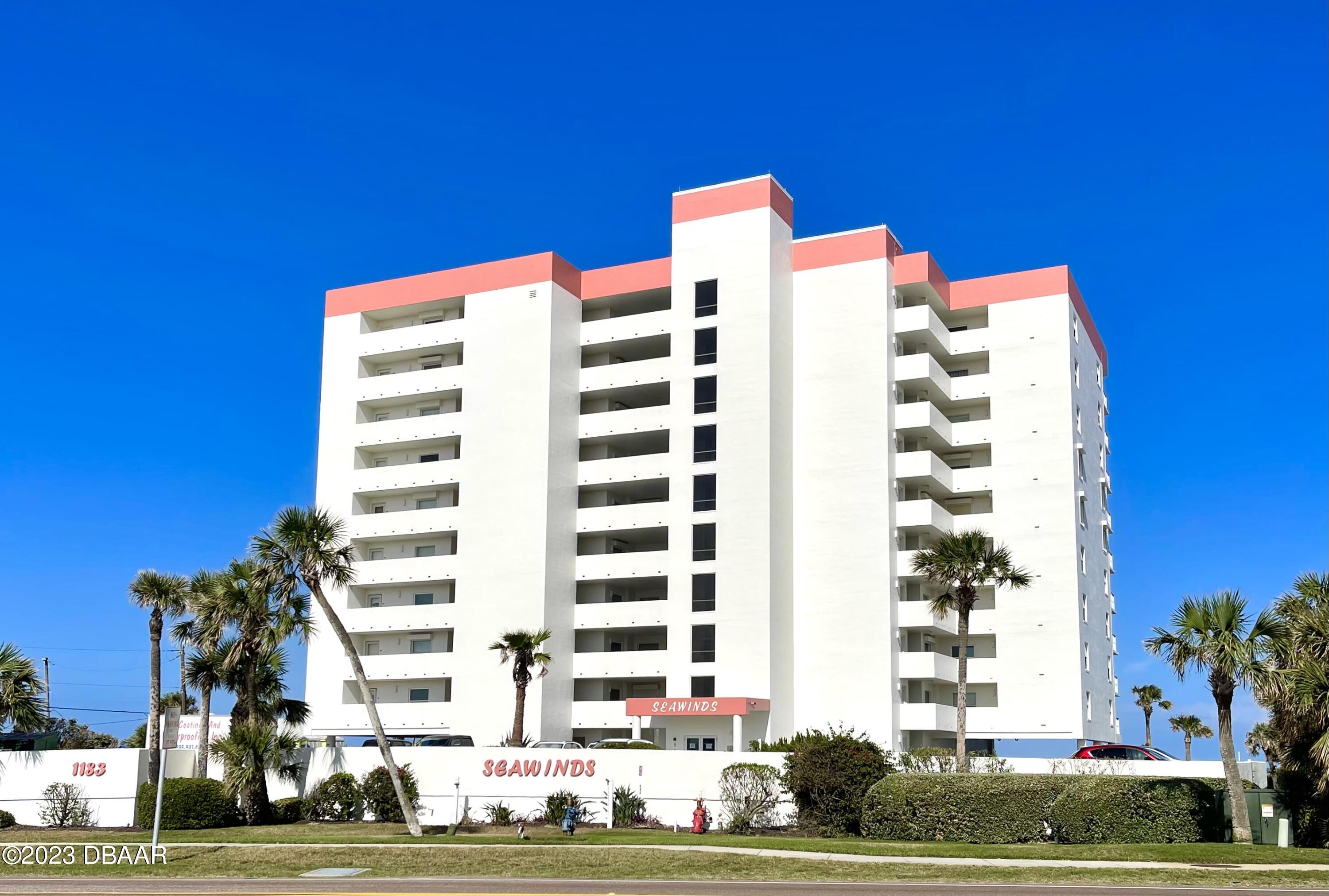 a front view of a building with yard