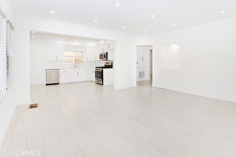 a view of a kitchen with a sink