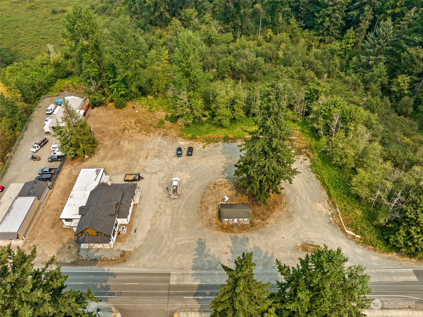 an aerial view of residential house with outdoor space