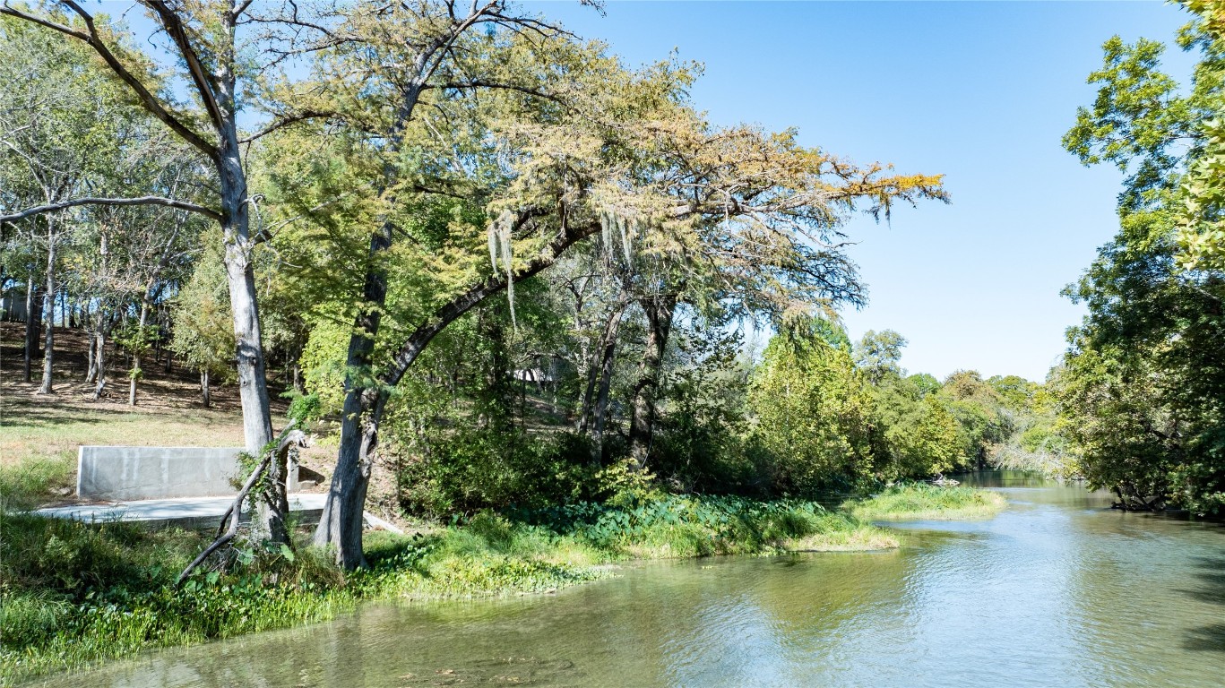 a view of a lake view with a garden