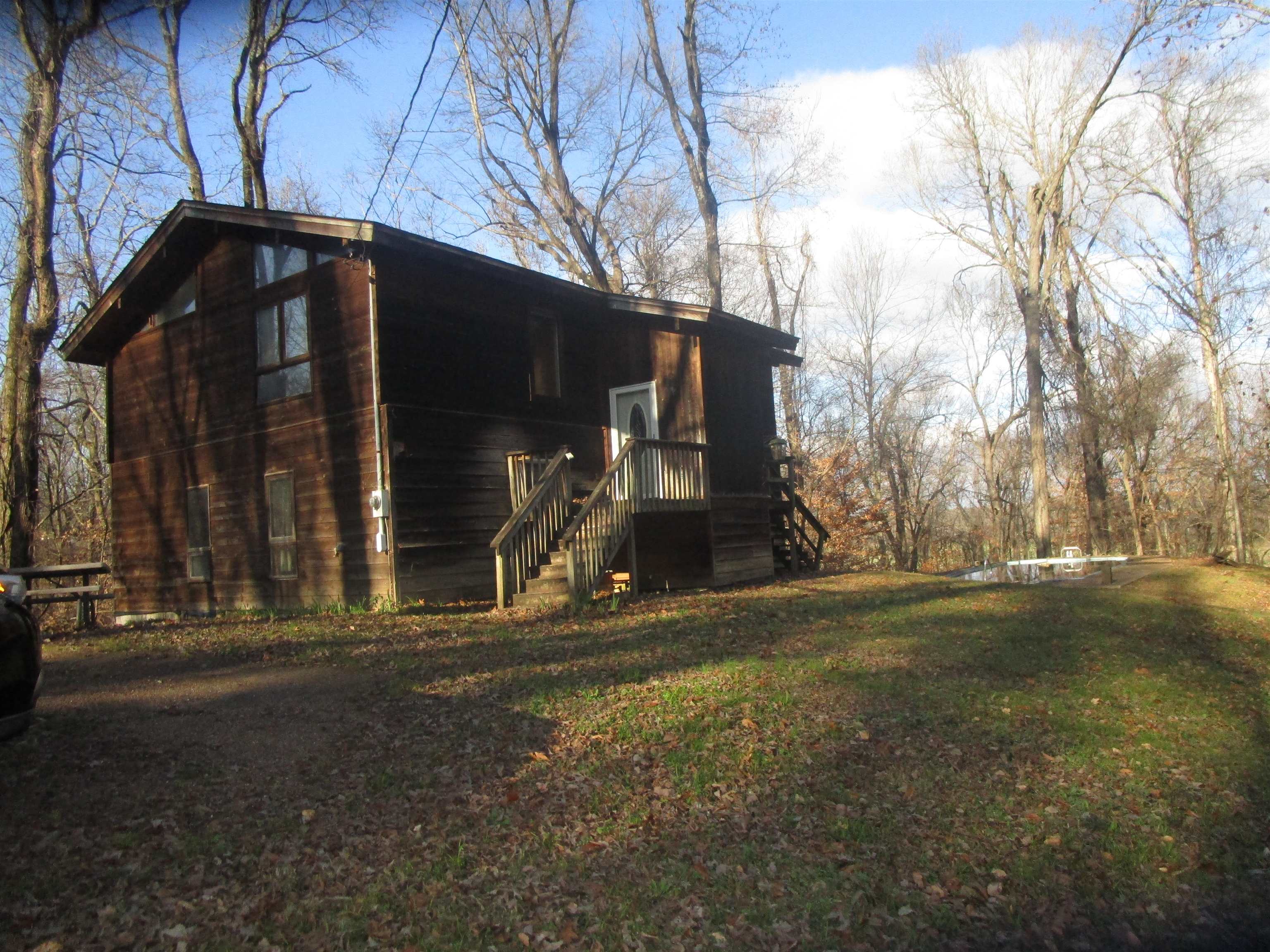 a house with trees in front of it